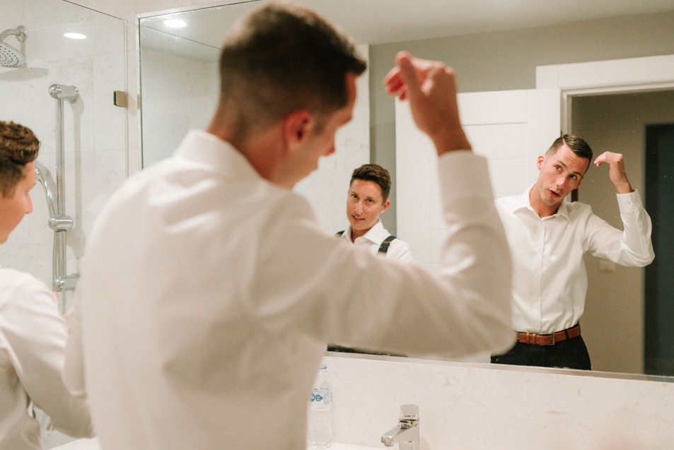 groom getting ready for Dominican wedding