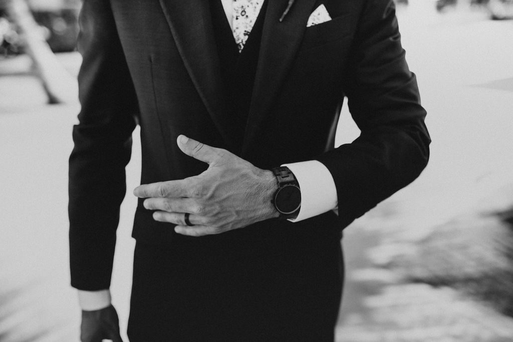 groom's hand with watch and ring