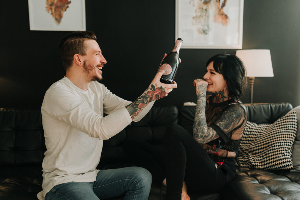 couple photoshoot ideas drinking champagne