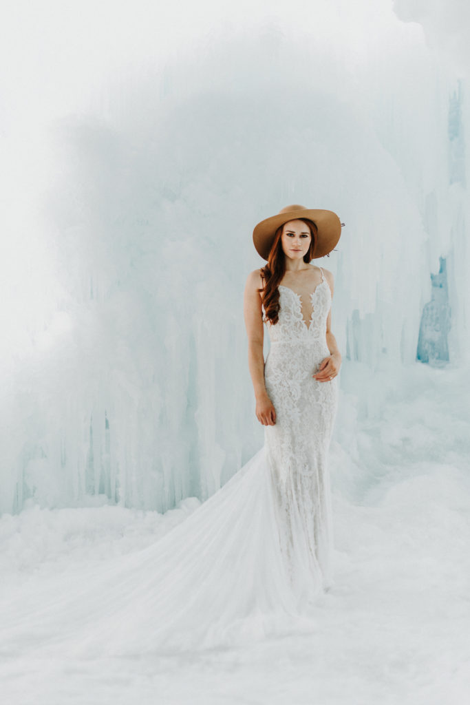 bride with hat eloping in mn ice castle