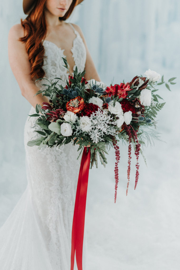 bride holding bouquet at mn winter wedding
